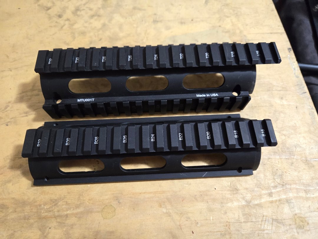 UTG Pro MTU001T Quad Rail System for AR-15 style Rifle.