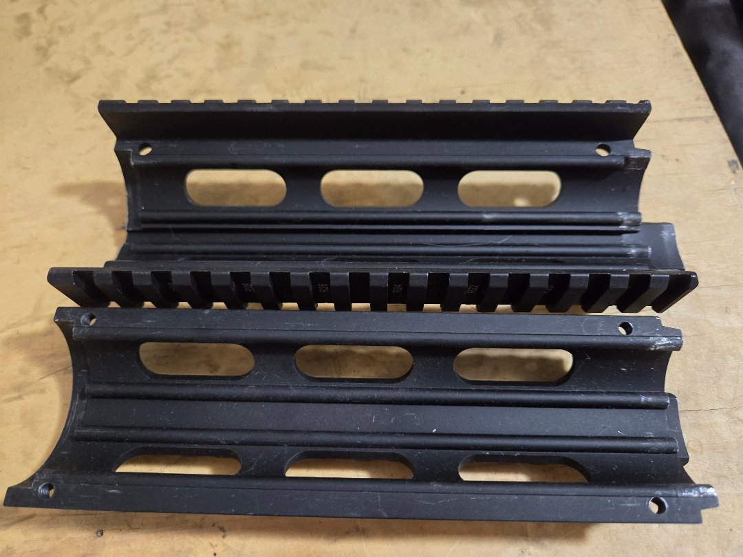 UTG Pro MTU001T Quad Rail System for AR-15 style Rifle.