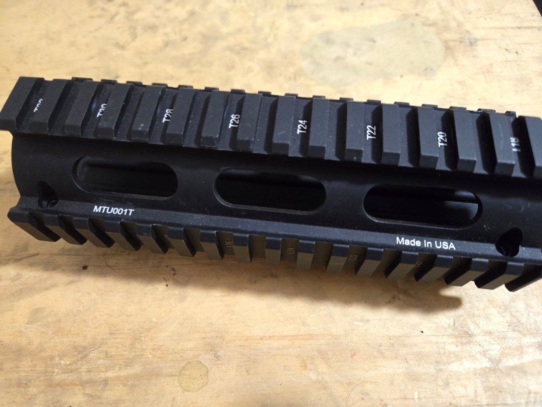 UTG Pro MTU001T Quad Rail System for AR-15 style Rifle.