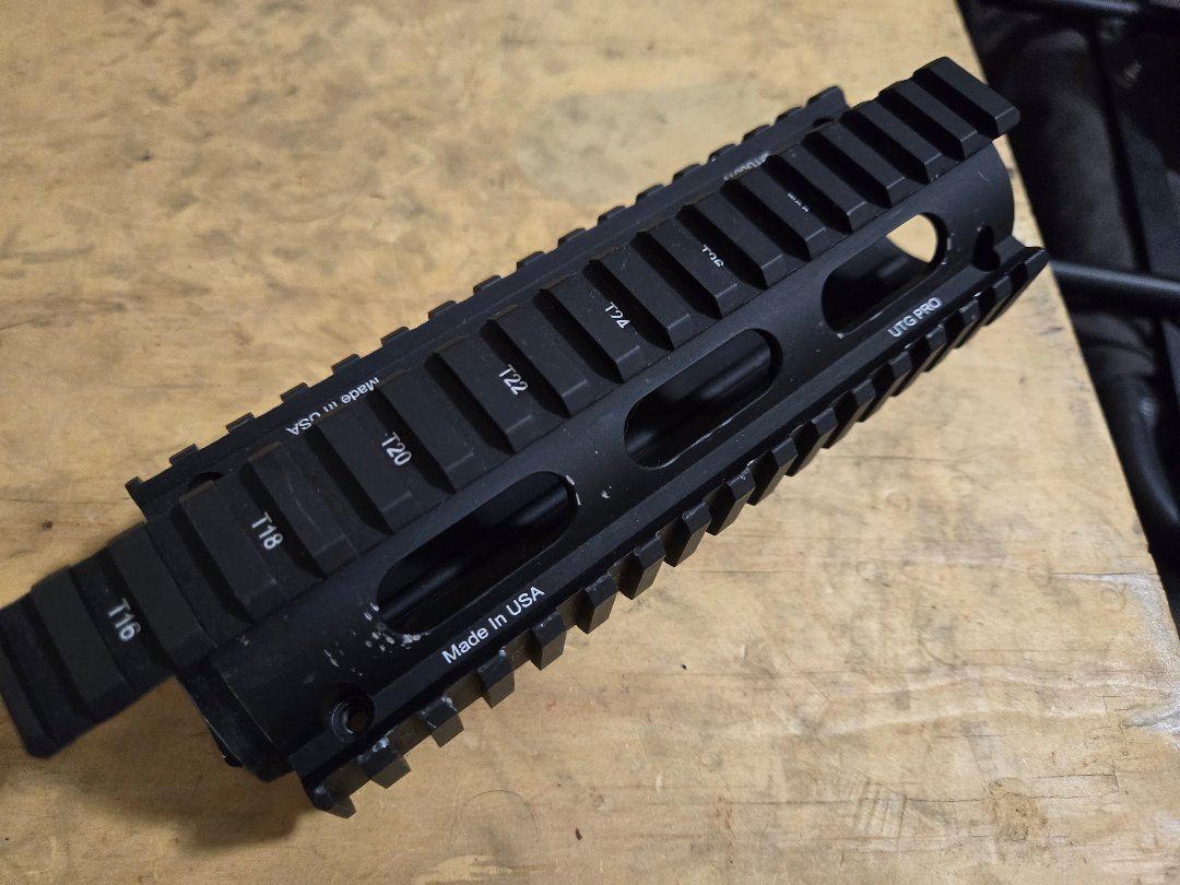 UTG Pro MTU001T Quad Rail System for AR-15 style Rifle.